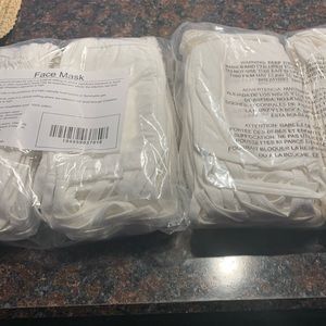 Face mask.  White cotton.  Brand new. Cloth can be used for crafts as well.